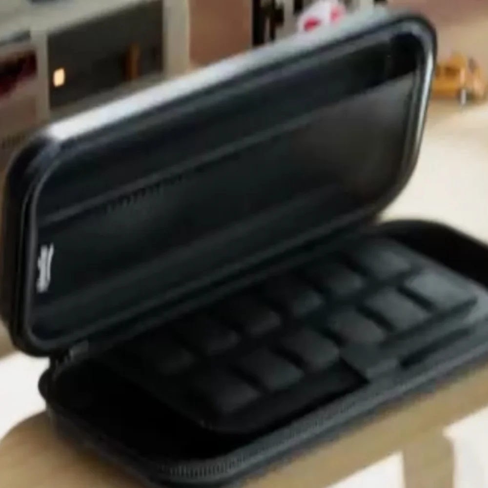 Portable Gaming Console Case with Red Accents